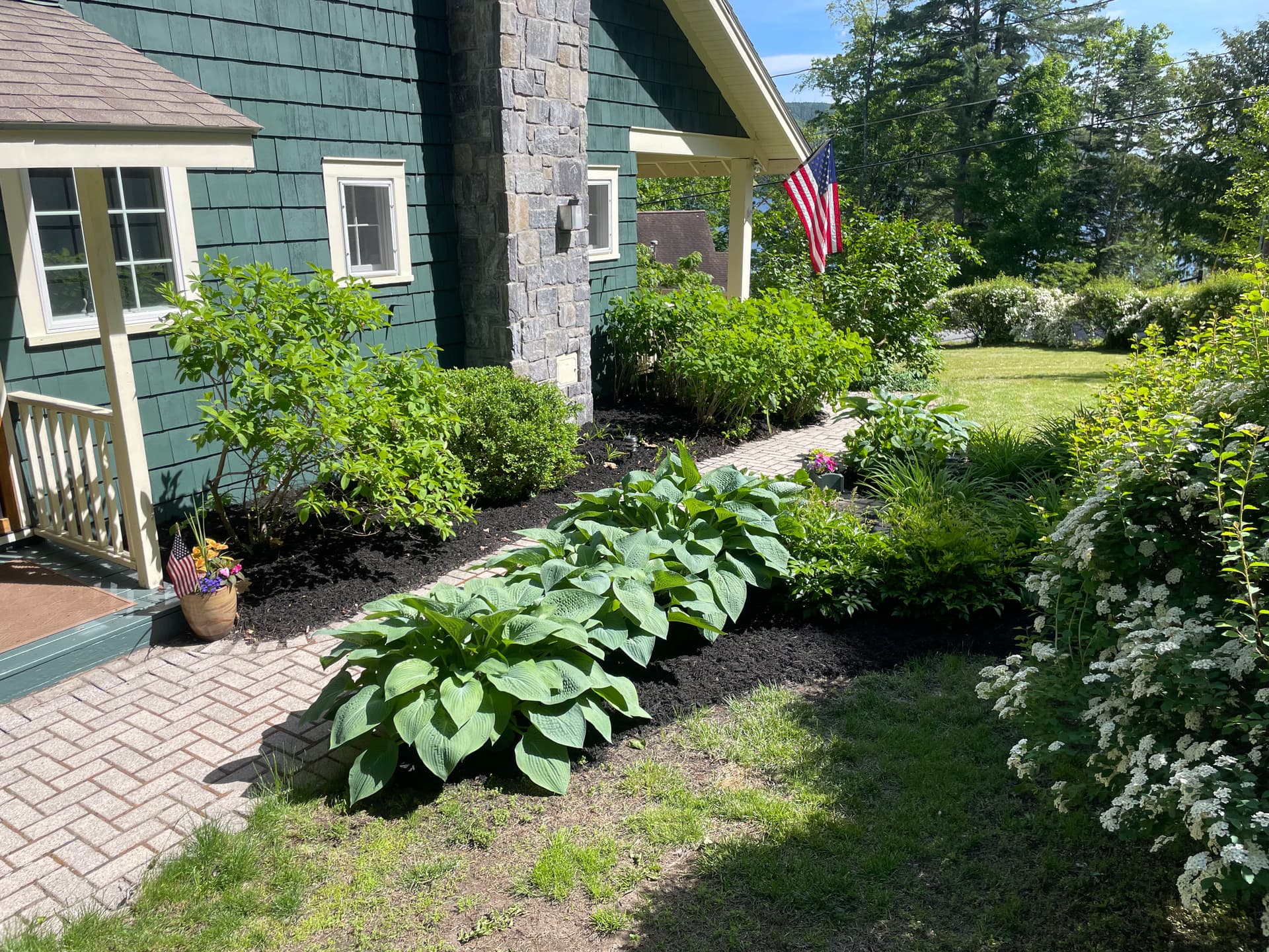 Fresh Mulch Beds Give This Lake George Property a Sharp New Look image