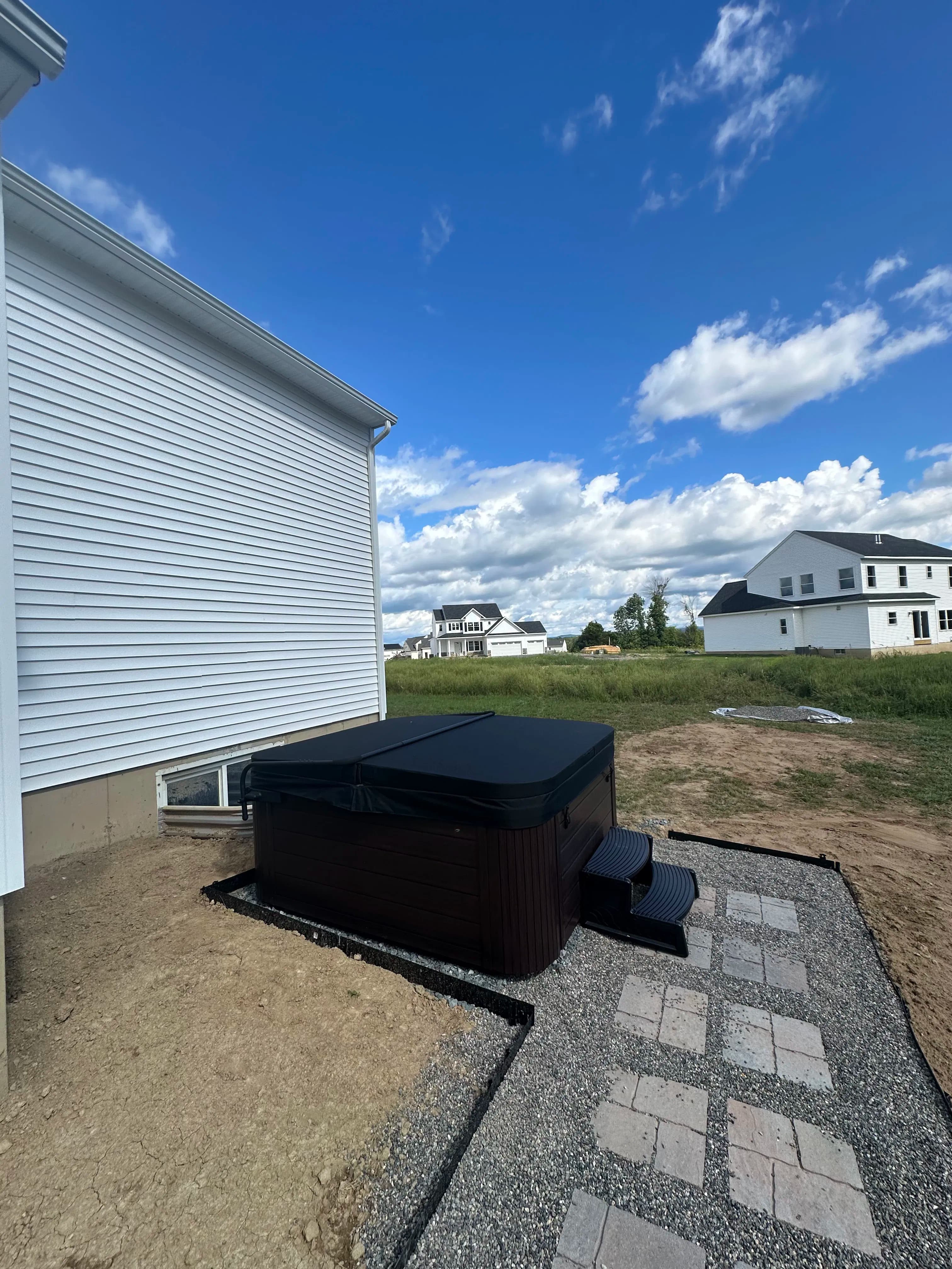 Project Paver Sidewalk and Hot Tub Pad Install in Mechanicville image